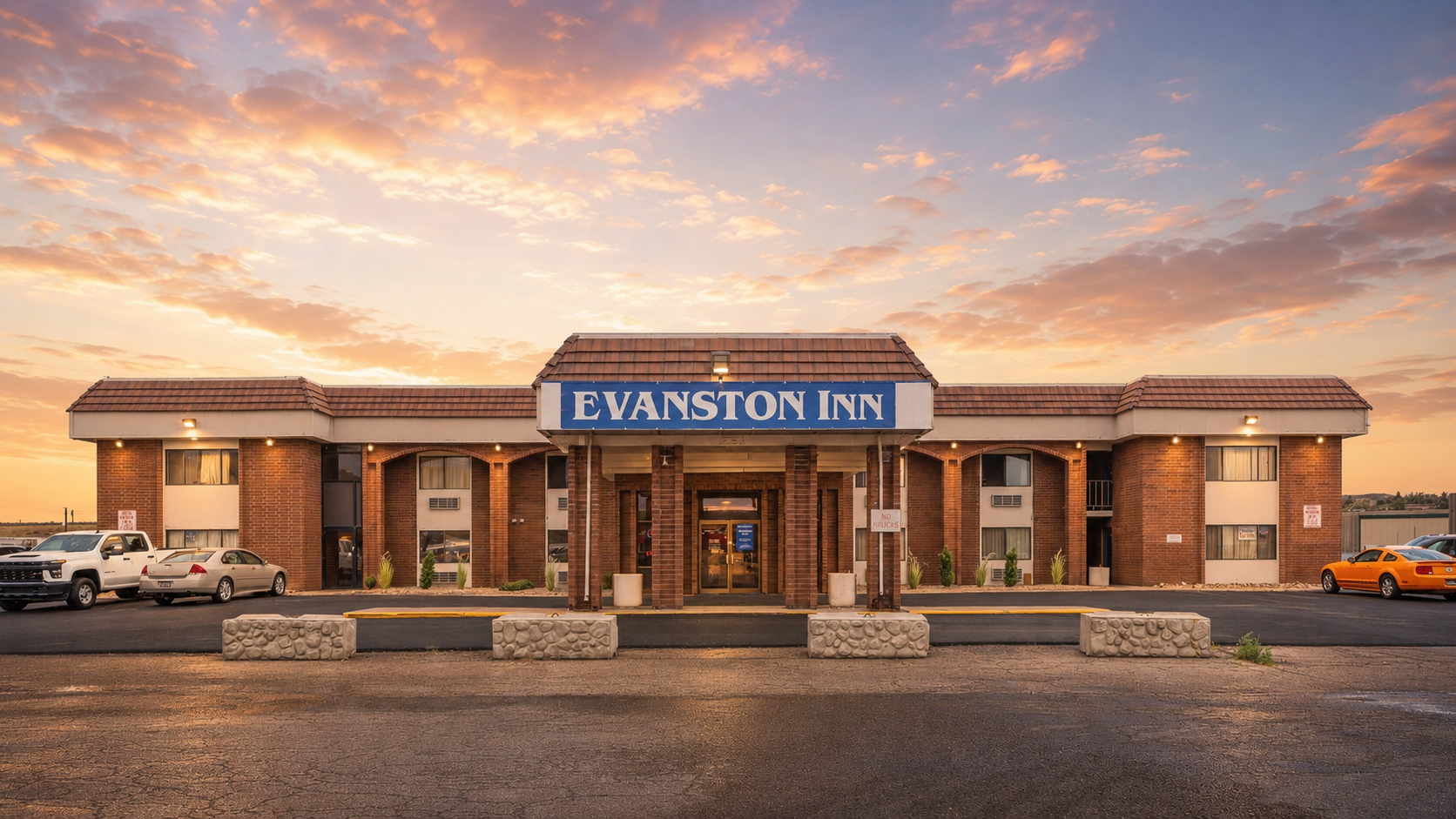 Evanston Inn exterior at dusk